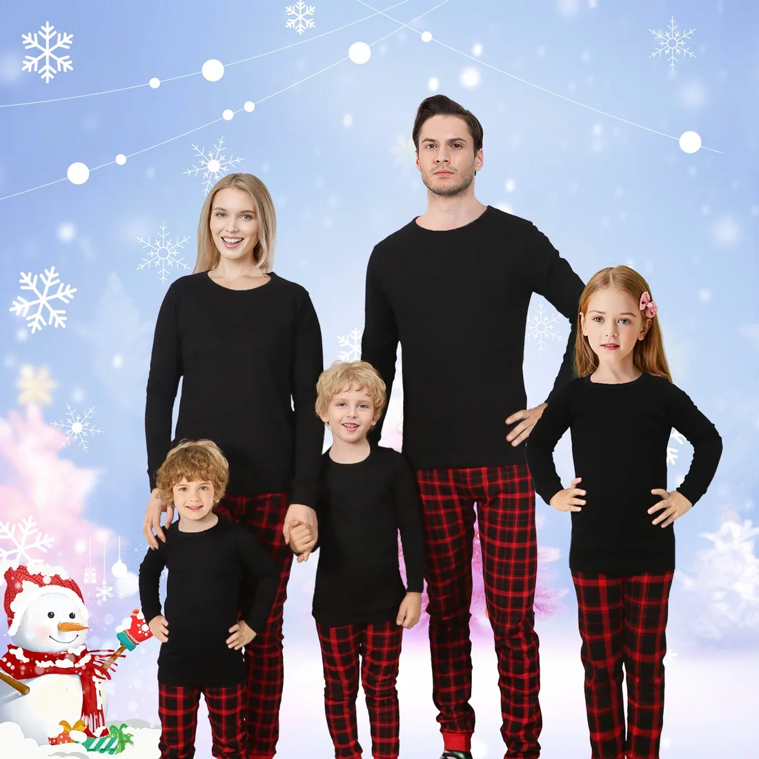 A Family Feeling family in matching pajamas